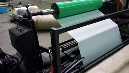 Machine d'enduction d'adhésif thermofusible double face